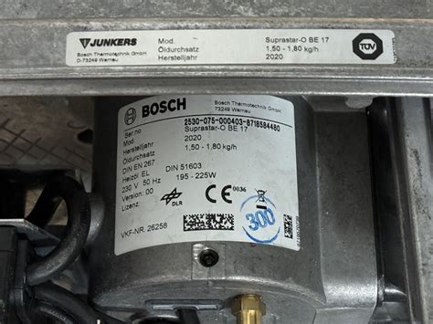 ilustrácia fúzie značiek Junkers a Bosch s historickými a modernými prvkami vykurovacej techniky