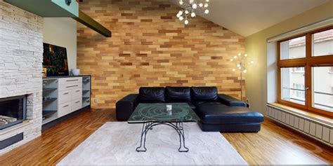 Ukážka kombinácie dreveného obkladu s inými materiálmi v modernom interiéri.