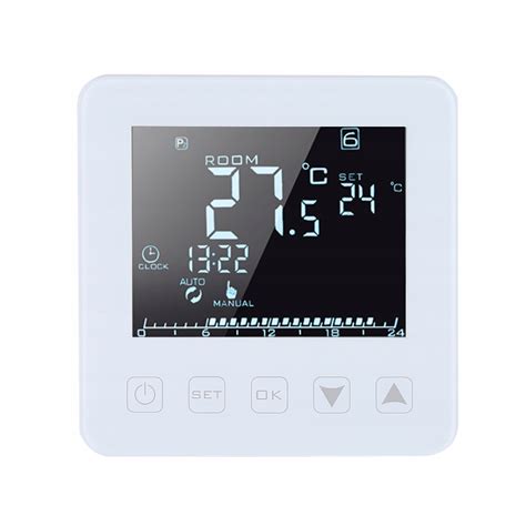 Detailný záber na LCD termostat s podsvieteným displejom na radiátore.