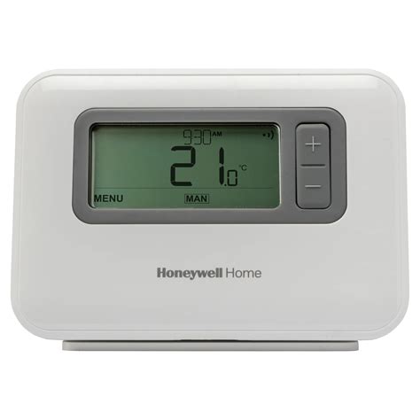 Ilustračná fotografia bezdrôtového termostatu Honeywell T3R položeného na stole v obývacej izbe.