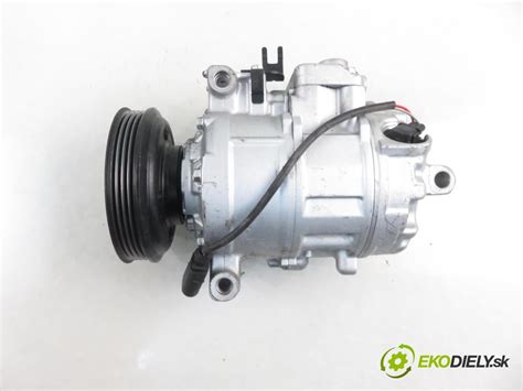kompresor klimatizácie s vyznačenou elektromagnetickou spojkou