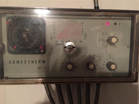 schéma zapojenia regulátora Komextherm RVT 052 s kotlom na tuhé palivo a štvorcestným ventilom Duomix